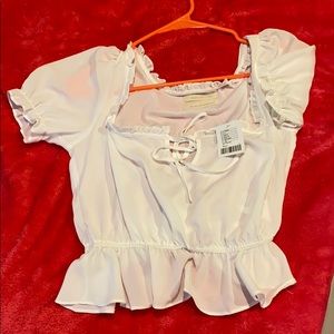 Cute crop top blouse, never worn.